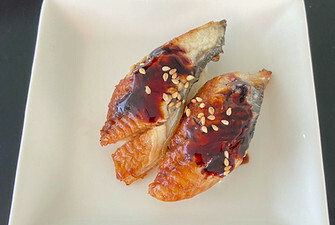 freshwater eel w/eel sauce and sesame on top