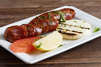 Spanish Sausage with Corn Cake (Chorizo con Arepa)