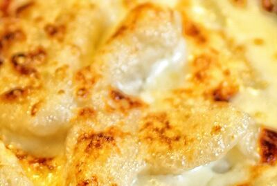 Strozzapreti gratinados en horno de leña
