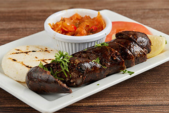 Blood Sausage with Corn Cake (Morcilla con Arepa)
