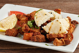 Pork Skin with Corn Cake (Chicharrón con Arepa)
