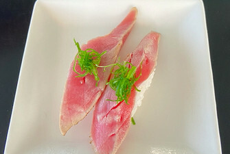 baby tuna w/green onion on top