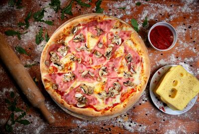 PROSCIUTTO FUNGHI