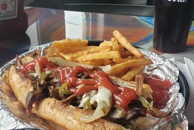 Signature Sandwiches 8”w/ fries and slaw