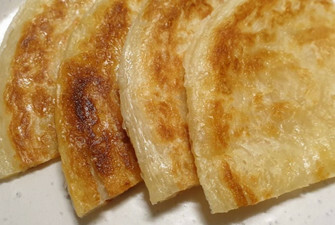 Roti Bread with homemade satay sauce