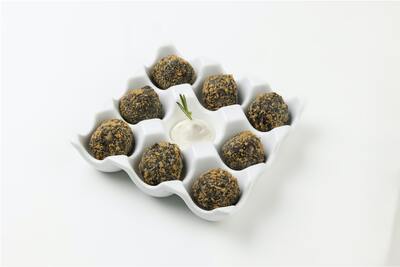 Croquetas de chipirones en su tinta